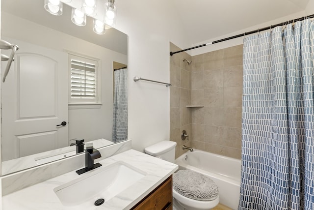 bathroom featuring vanity, toilet, and shower / tub combo with curtain