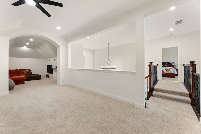 hall with baseboards, carpet floors, visible vents, and recessed lighting