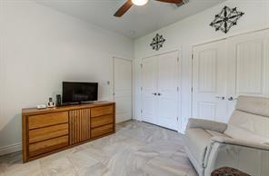 interior space featuring a ceiling fan