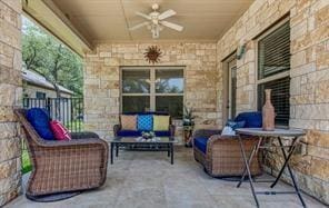 view of patio / terrace featuring ceiling fan and an outdoor hangout area