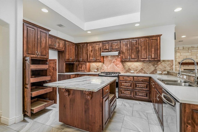 604 Caprock Canyon Trl, Georgetown, TX 78633 - kitchen with a sink, visible vents, under cabinet range hood, appliances with stainless steel finishes, and recessed lighting