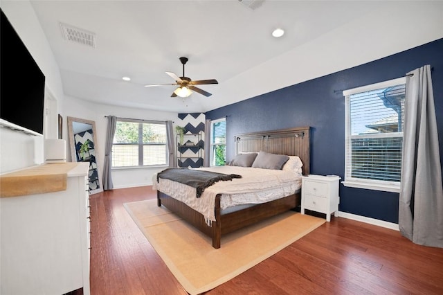 2405 Billy Pat Rd, Leander, TX 78641 - bedroom with wood finished floors, recessed lighting, and ceiling fan