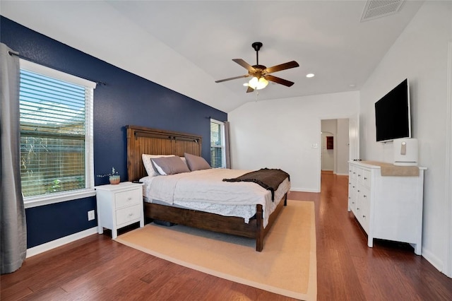 2405 Billy Pat Rd, Leander, TX 78641 - bedroom featuring wood finished floors, vaulted ceiling, baseboards, and ceiling fan
