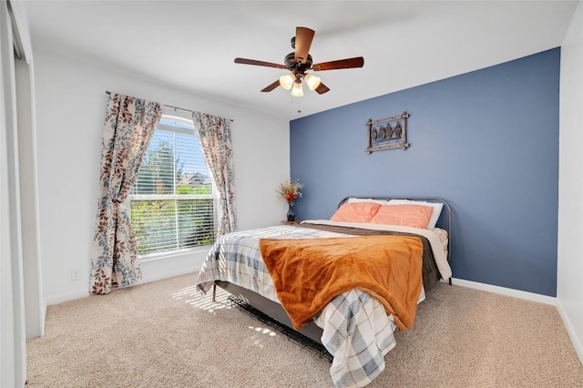 2405 Billy Pat Rd, Leander, TX 78641 - bedroom with carpet floors, baseboards, and ceiling fan