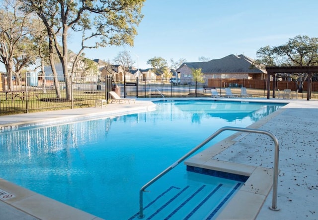 2405 Billy Pat Rd, Leander, TX 78641 - community pool with a residential view and a patio