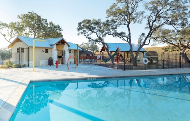 2405 Billy Pat Rd, Leander, TX 78641 - community pool featuring a patio