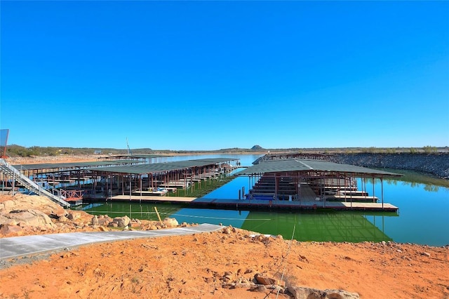 dock area with a water view