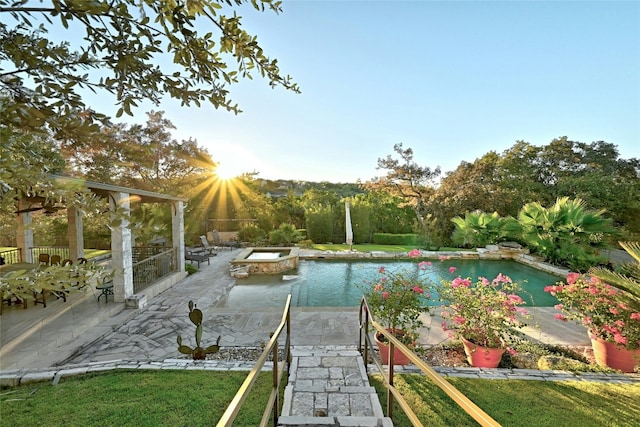 view of swimming pool with a fenced in pool and a patio