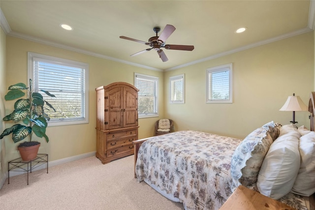 bedroom featuring multiple windows, crown molding, and light carpet