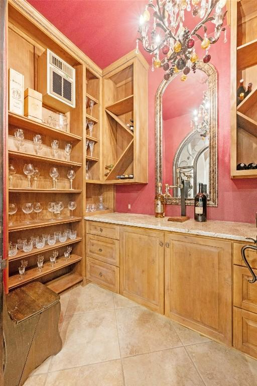 wine room with visible vents and light tile patterned floors