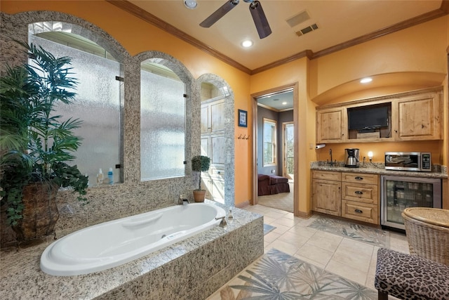 bathroom with ornamental molding, wine cooler, ensuite bath, and vanity