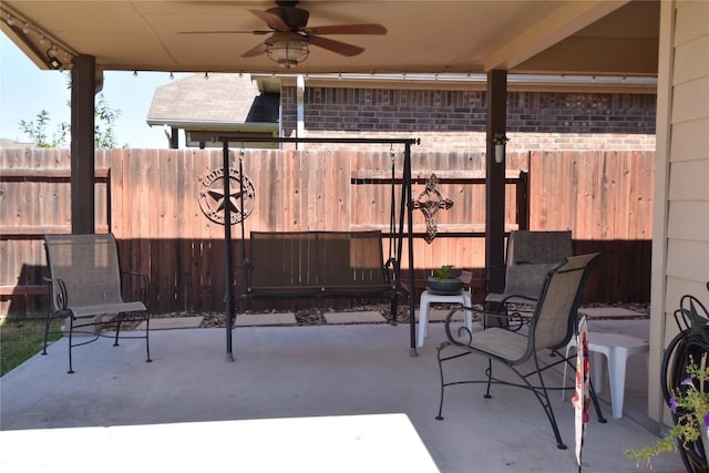 221 Joseph Dr, Buda, TX 78610 - view of patio / terrace featuring a ceiling fan and fence