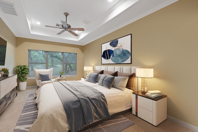 bedroom with ornamental molding, a tray ceiling, visible vents, and baseboards