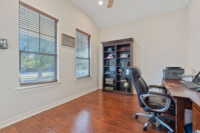 office space with ornamental molding, lofted ceiling, dark wood finished floors, and baseboards