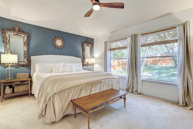 bedroom featuring carpet flooring, a ceiling fan, and baseboards