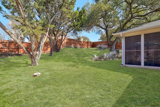 view of yard featuring a fenced backyard