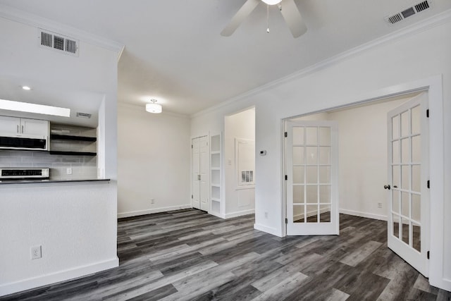 kitchen with open shelves, backsplash, visible vents, and crown molding