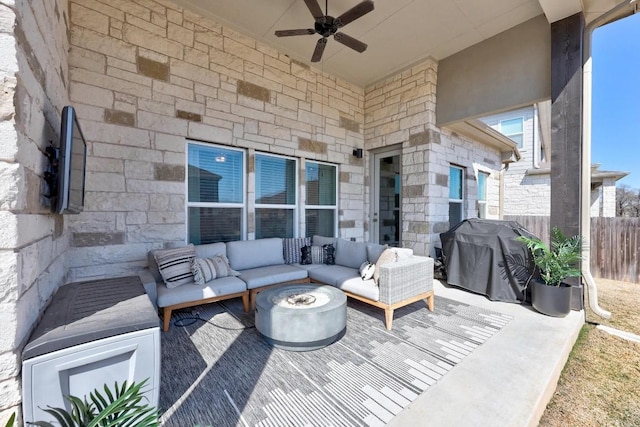 view of patio featuring ceiling fan, outdoor lounge area, a grill, and fence