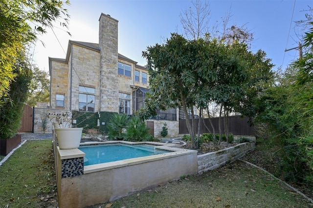 view of pool featuring fence and a fenced in pool