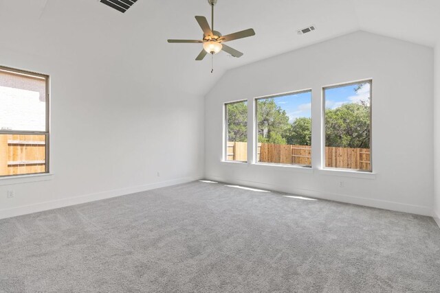 100 Wild Bluebell Cv, Georgetown, TX 78628 - spare room with vaulted ceiling, ceiling fan, and carpet flooring