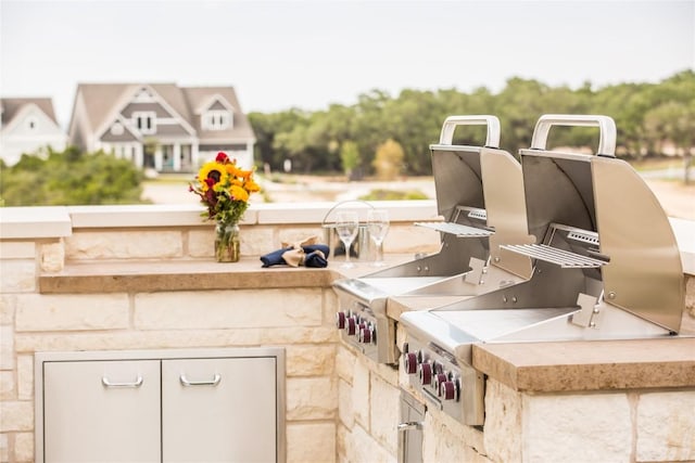 view of patio / terrace featuring an outdoor kitchen