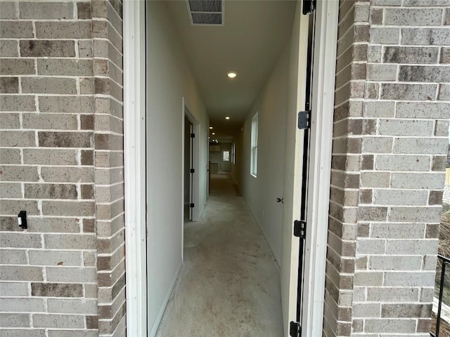 hallway featuring visible vents