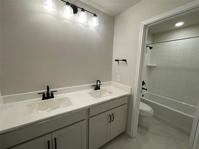 bathroom featuring shower / bathtub combination, a sink, toilet, and double vanity