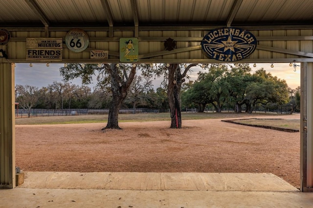 view of yard at dusk