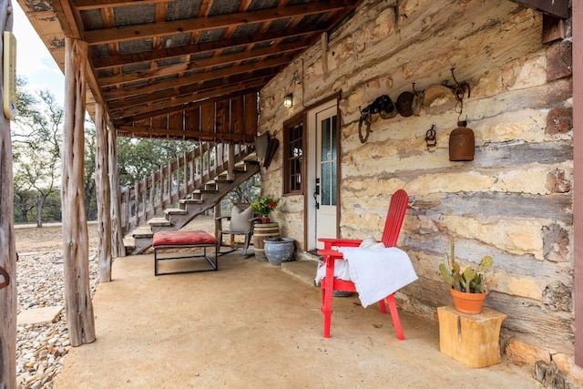 view of patio / terrace featuring stairway