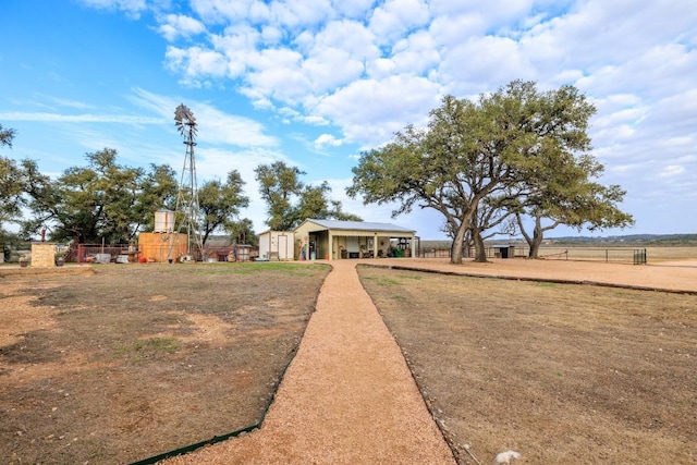 view of front of house featuring fence