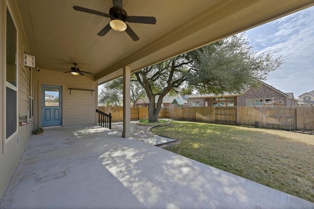 view of patio / terrace with a fenced backyard and a ceiling fan