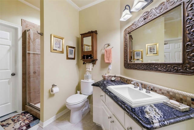 bathroom with crown molding, toilet, a shower stall, vanity, and tile patterned floors