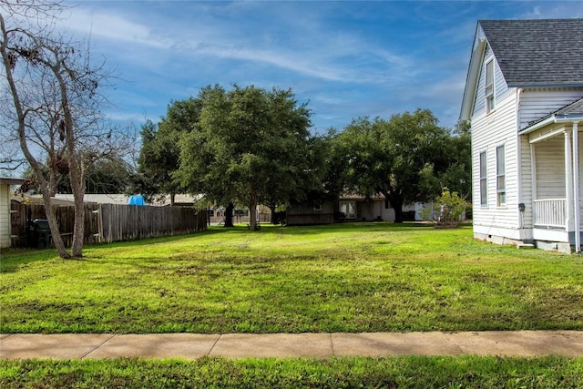 view of yard featuring fence