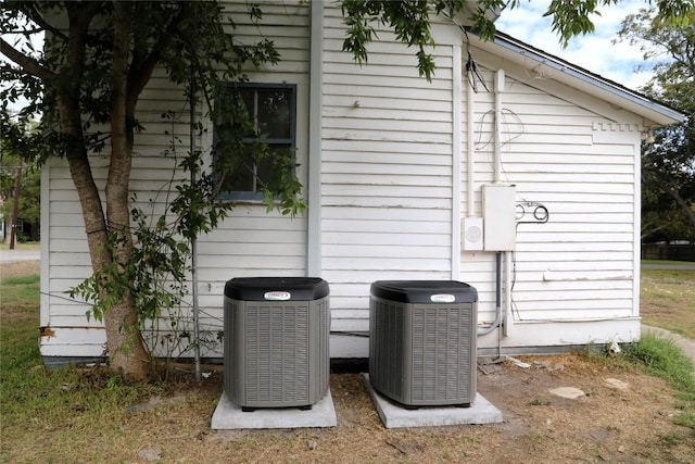 exterior details featuring cooling unit