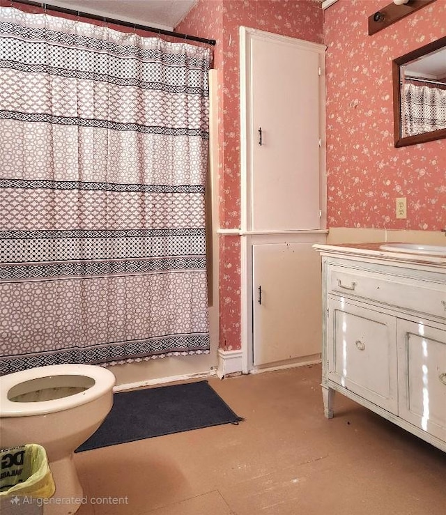 full bath with toilet, wallpapered walls, and vanity