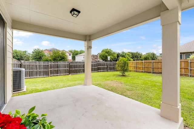 view of patio with a fenced backyard and cooling unit