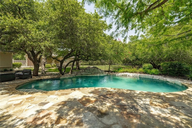 pool with a patio