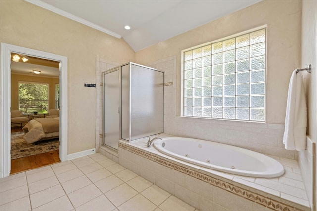 full bathroom with a stall shower, lofted ceiling, ensuite bathroom, and tile patterned floors