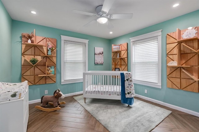 bedroom featuring multiple windows, recessed lighting, a ceiling fan, and baseboards