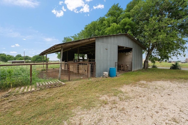 view of outbuilding with an outbuilding and an exterior structure