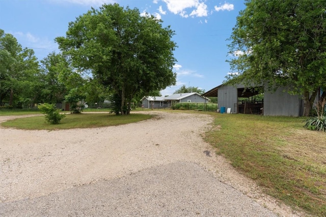 view of road featuring driveway