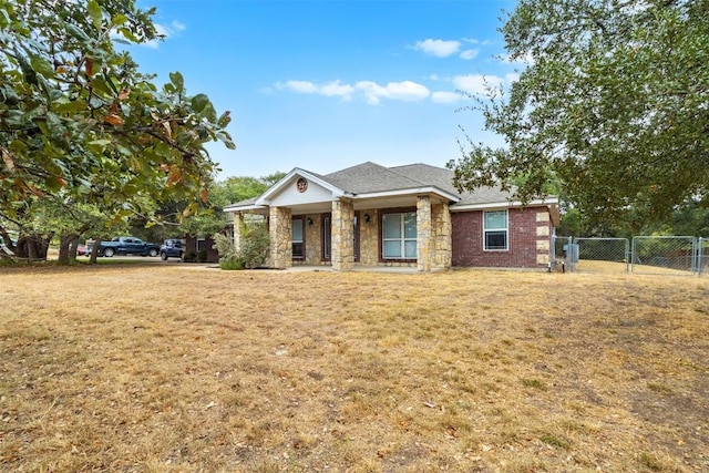 3640 Big Divide Rd, Copperas Cove, TX 76522 - view of front of home with a gate, stone siding, and covered porch