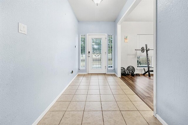 3640 Big Divide Rd, Copperas Cove, TX 76522 - entryway featuring a textured wall and light tile patterned flooring