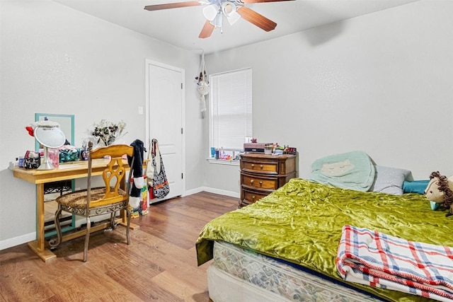 3640 Big Divide Rd, Copperas Cove, TX 76522 - bedroom with wood finished floors and a ceiling fan
