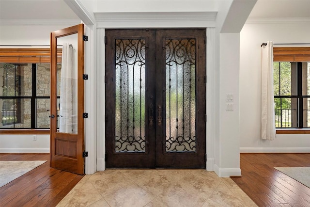 41 Tiburon Dr, The Hills, TX 78738 - entrance foyer with french doors, wood-type flooring, and ornamental molding