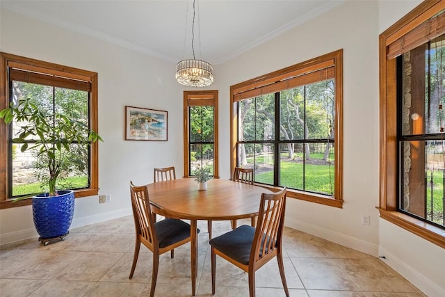 41 Tiburon Dr, The Hills, TX 78738 - dining space featuring a chandelier, crown molding, and light tile patterned floors