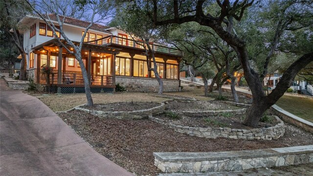 5242 Mccormick Mountain Dr Unit E, Austin, TX 78734 - rear view of property featuring a balcony and a porch