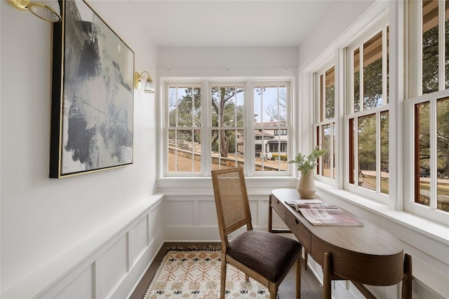 5242 Mccormick Mountain Dr Unit E, Austin, TX 78734 - sunroom featuring a decorative wall and wainscoting