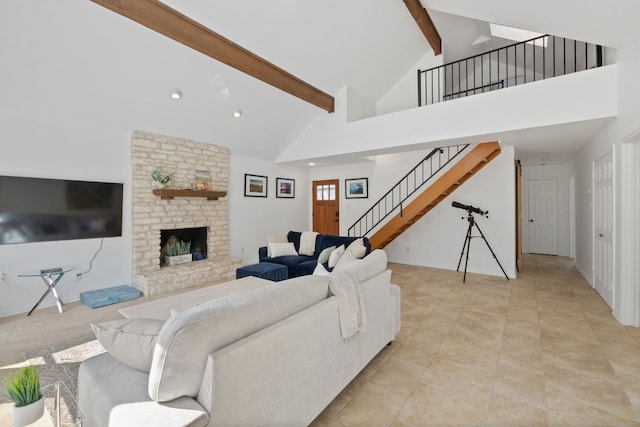 living area with a large fireplace, stairway, beamed ceiling, high vaulted ceiling, and recessed lighting