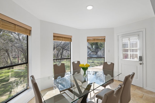 dining space with a wealth of natural light and recessed lighting